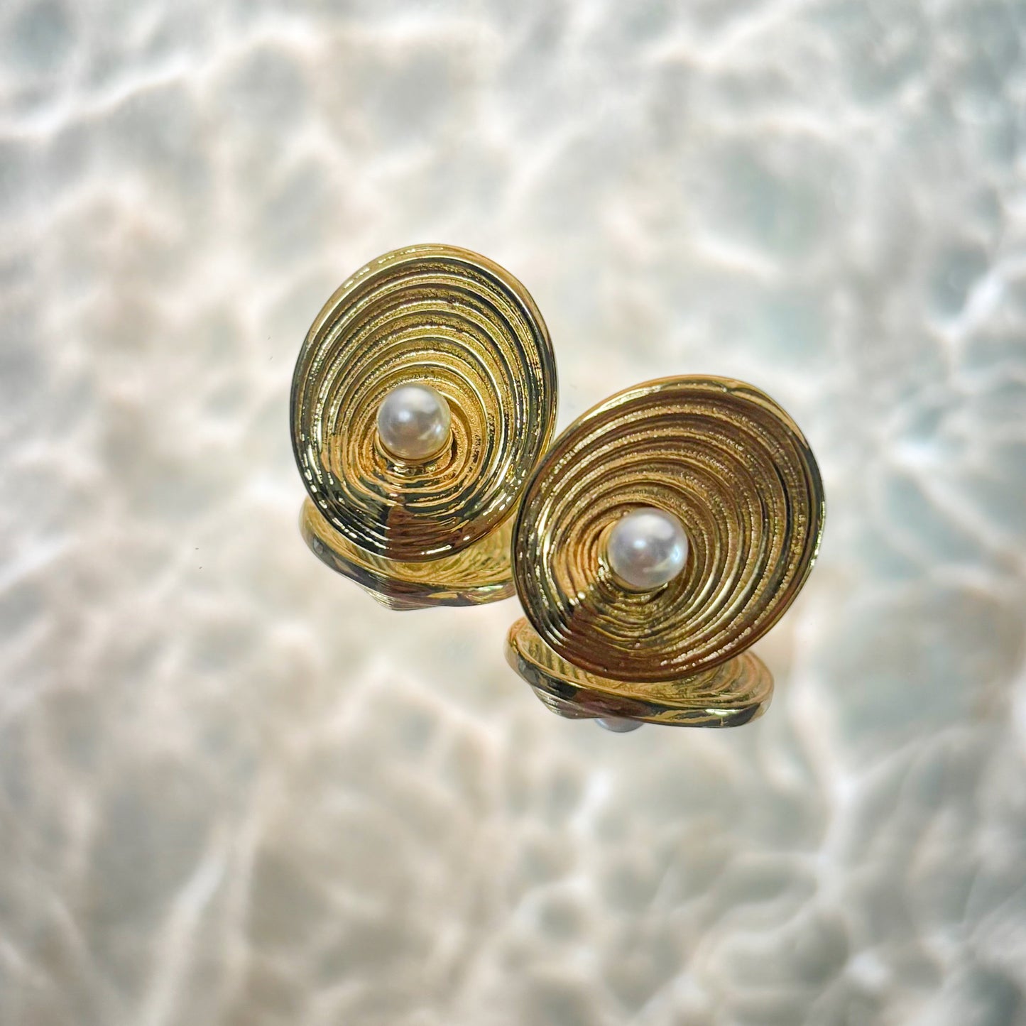 Siren's Glow Statement Studs